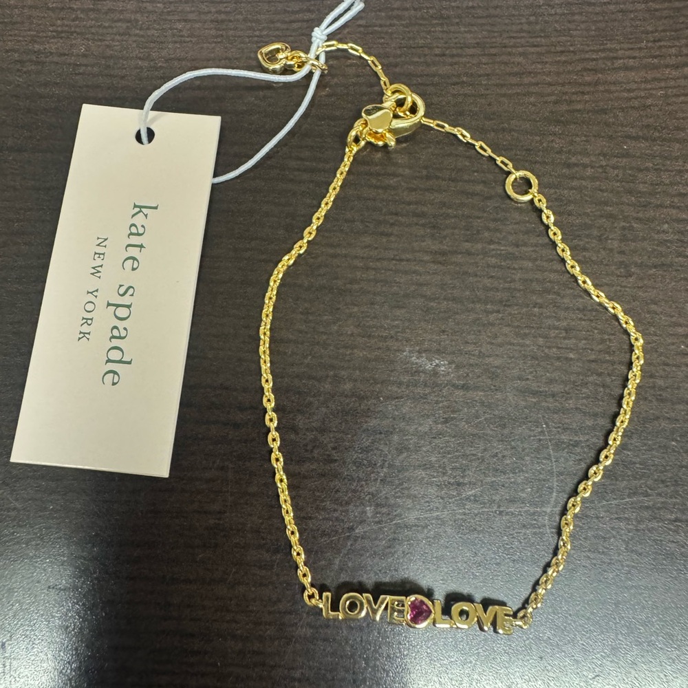 Kate Spade 7, 8 or 9” Gold Color Love Bracelet with Red Gem- New